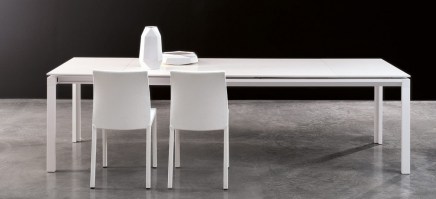 Chat table with two extensions, in white.